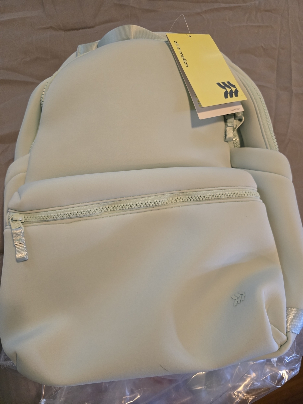 all in motion Mint Mini Backpack Tag